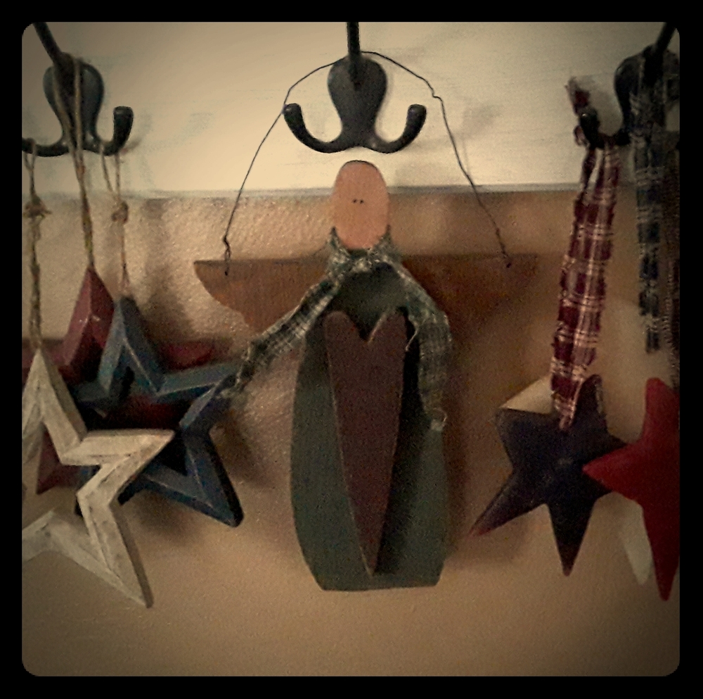 Primitive wood and wax hanging stars